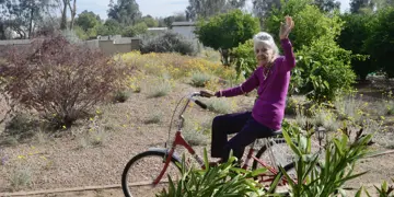 Dr Gladys Mcgarey Cycling In Garden Aged 102