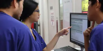 Resident Doctors Looking At Screen 20664 16X9